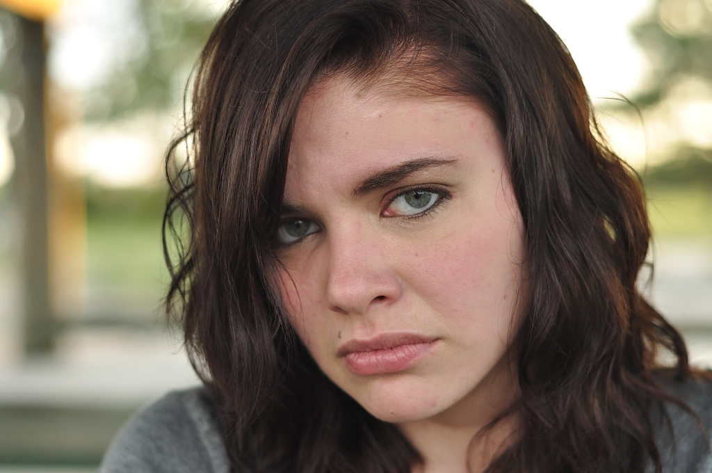 Girl Face Model Brown hair Curly Cute Medium hairstyles Sad