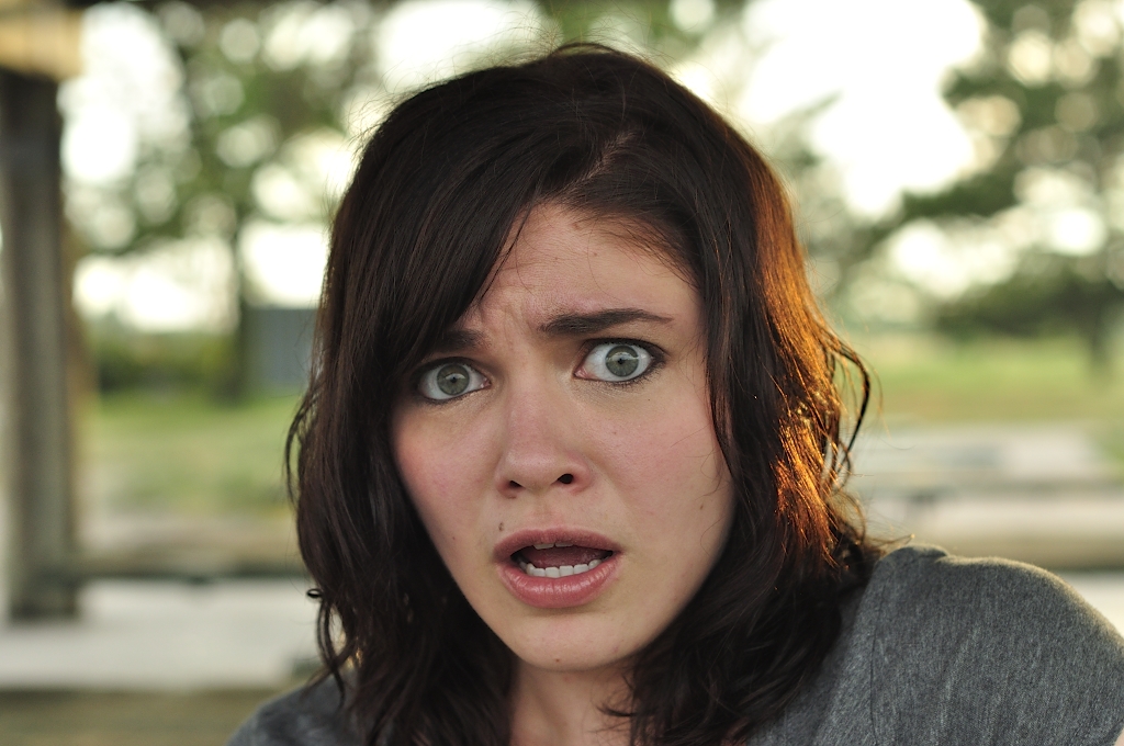 Model Brown hair Curly Beautiful Medium hairstyles Angry Girl Face