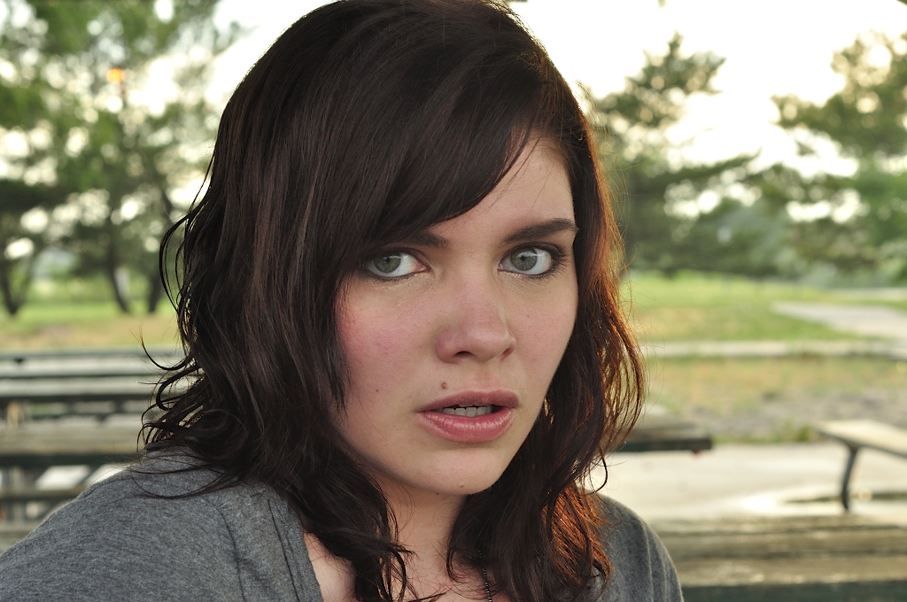 Model Brown hair Curly Medium hairstyles Angry Face Girl