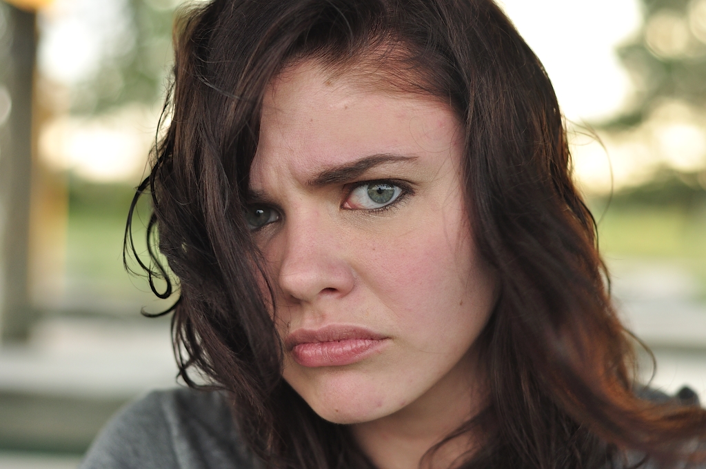 Model Brown hair Curly Medium hairstyles Angry Girl Face
