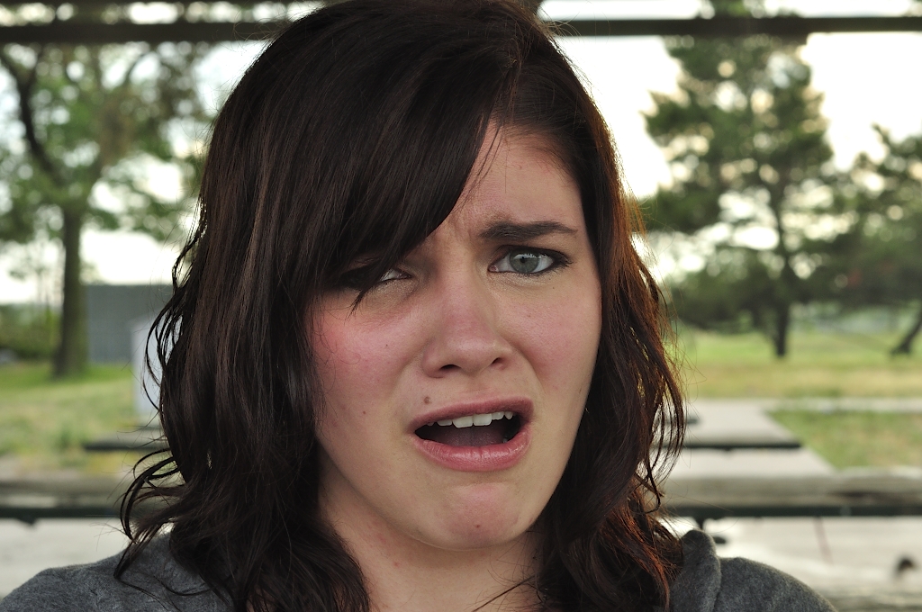 Model Medium hairstyles Angry Girl Face Curly brown hair
