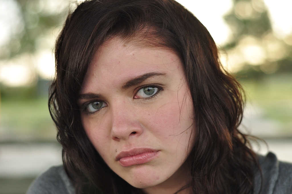 Model Medium hairstyles Face Girl Curly brown hair Pretty Sad