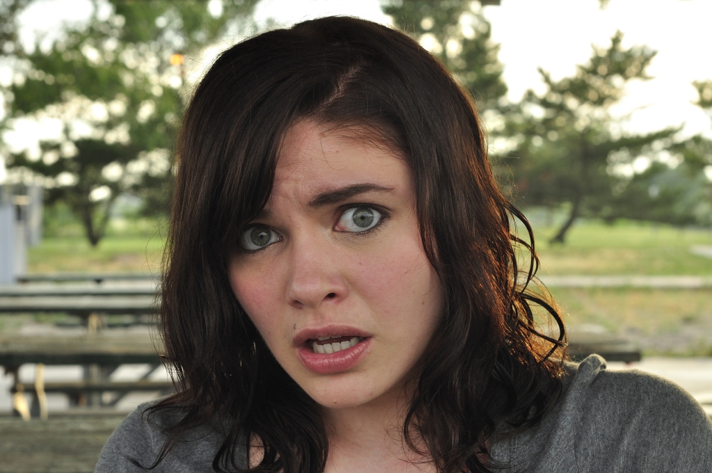Model Medium hairstyles Girl Face Curly brown hair Scared
