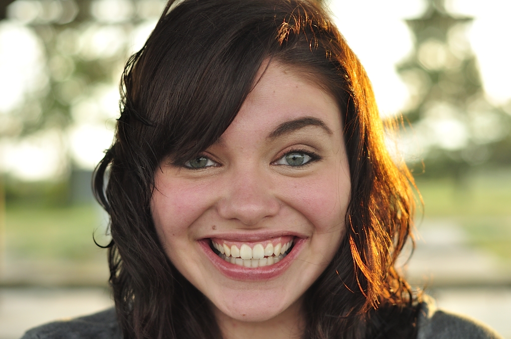 Model Medium hairstyles Girl Face Curly brown hair White Smile Happy