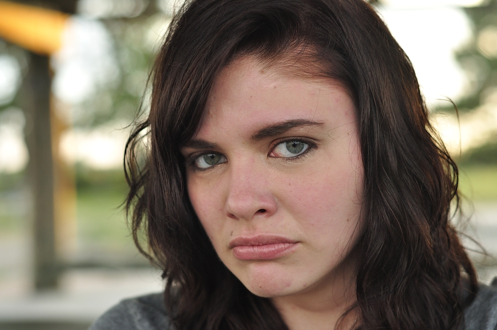 Model Medium hairstyles Sad Girl Face Curly brown hair Beautiful Frown